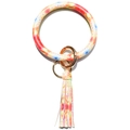 Macro detail of tie-dye pattern leather bangle keychain with long fringe and gold hardware - Yellow Tie-Dye