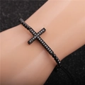 Close-up of black beaded cross bracelet featuring shimmering micro-inlaid zircon stones - Cross / Gun Black