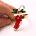 Christmas boot napkin ring with red enamel and crystals held against a white background - Christmas Boot Charm