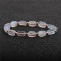 Elegante pulsera de cuentas con piedras de luna ovaladas iridiscentes y detalles de cobre rosa - Cuentas Ovaladas Esmeriladas Iridiscentes Con Espaciadores de Oro Rosa / Piedra de Luna Iridiscente (3#)