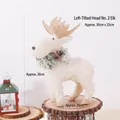 White reindeer Christmas ornament with festive wreath on a wood base, 30cm high - Left Tilted Head Standing Reindeer