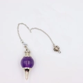 Handcrafted purple crystal pendulum with silver hollow bead cage and chain for dowsing - Amethyst