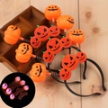Detail showing glowing LED Halloween pumpkin headbands with spring Jack-o'-lantern design - Three-head Pumpkin