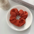 Brick red striped organza scrunchie displayed on a minimalist white ceramic tray - Maple Red Twill