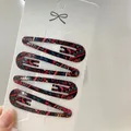 Set of four vintage graffiti pattern teardrop BB hair clips on display card - Artistic Graffiti