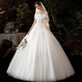 Elegante vestido de novia blanco con lentejuelas, plumas y velo largo de tul - US 26W / Largo al suelo / Blanco