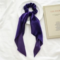 Purple velvet scrunchie with long ribbons displayed on a white decorative plate - Dark Purple Velvet Streamer