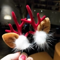 Christmas reindeer hair clips featuring red flocking antlers and soft white fur balls - 25 Red Antler with White Pom Pom Pair