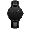 Detail of khorasan watch with black leather strap and striking blue hands on black dial - Leather Strap Blue Hands