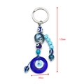 Dettaglio portachiavi Occhio del Male con lunghezza totale di 125mm e ciondolo da 30mm - Stile Disco Malocchio Tondo (BE29BU10)