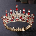 Detailed view of golden leaf crown featuring red crystals and clear rhinestones - Gold with Red Rhinestones