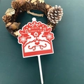 Acrylic Merry Christmas cake topper with reindeer and snowflakes on festive wreath - White Base Style E