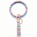 Colorful striped leather bangle keychain with leopard print and tassel detail - Christmas