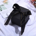 Elegant black matte gift box featuring a black satin ribbon with gold edges on white fabric - Obsidian Black; String Lights (1 Meter Long)