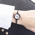 Minimalist quartz bangle watch with black round dial and twisted gold rope bracelet - Roman Numerals Black Band White Dial
