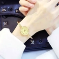 Women's gold bangle quartz watch with a twisted cable strap and cream Arabic dial - Arabic Numerals Gold Band Gold Dial