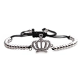 Detail of silver crown charm with micro-pave cubic zirconia and black cord bracelet - Crown B0138 / White Gold