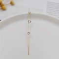 Elegant gold crawler earrings featuring three sparkling zircon stones in a vertical row - Three Round Zircon Gold