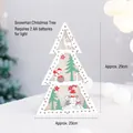 Wooden Christmas tree light box with elk and snowman silhouettes and warm LED lighting - Snowman