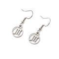Macro detail of silver stainless steel earrings with hollow Scorpio zodiac symbol design - Scorpio