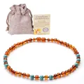 Barnsteen baby bijtketting met turkoois en authentiek linnen opbergzakje - Turkoois Barnsteen Ketting