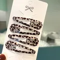 Set of 4 vintage leopard print 6cm drop clips on white display card for girls - Leopard Print