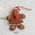 Resin gingerbread man Christmas tree ornament with red bow and heart, size 8x7cm - No.1 Red Heart Style