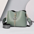 Chic green shell bag with a bow charm and a black-and-white herringbone canvas strap - Light Green