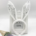 Detail view of white plush bunny ear headband with shimmering silver sequins - White Sequin Bunny