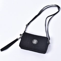 Zwarte mini canvas telefoontas met schouderriem en afneembare polsband - Zwart Crossbody