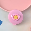 Pink round retractable measuring tape featuring yellow star and white wing design - Star with Small Wings