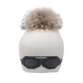 Close-up of cream knit beanie featuring raccoon fur pompom and goggle pattern detail - Adult / Beige-Real Raccoon Fur Pom