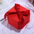 Square red gift box with luxury texture and a large matching red satin ribbon bow - Bright Red; String Lights (1 Meter Long)