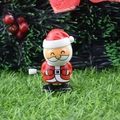 Wind-up Santa Claus jumping toy in red and white plastic for Christmas gifts - Head-shaking Santa