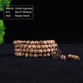 Macro detail of 108 agarwood beads bracelet with 6mm diameter and Chinese knot - Plain Style / 6mm*108 Beads