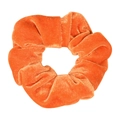 Detailed view of the orange velvet scrunchie, soft hair tie for ponytails and daily styling. - Orange
