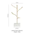 Golden branch-shaped jewelry stand with square white terrazzo base for home decor - Terrazzo Square Base Jewelry Rack