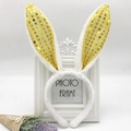 Detail showing white plush rabbit ears with gold sequins on a festive party headband - Yellow Sequin Bunny