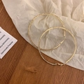 Chic golden hoop earrings with sparkling white crystals on soft white textured paper - Gold (Large Size)