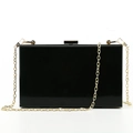 Black acrylic evening clutch bag with gold chain strap and polished mirror finish - Black