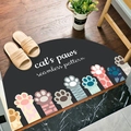 Semi-circle dark grey door mat with colorful cat paw pattern and cat's paws lettering - Cat Paw