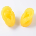 A pair of realistic yellow silicone ear models for jewelry display and teaching - Yellow