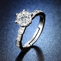 Classic silver six-prong engagement ring with large moissanite center stone on blue surface - Y083【1 Carat】