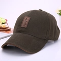 Classic dark green baseball cap with brown leather golf patch and six-panel structure - Light Coffee