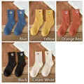 Five pairs of thick cotton crew socks in blue, yellow, orange, black, and cream colors - One Size / Cartoon Dog Mix Group A