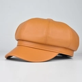 Detailed side view of khaki PU leather newsboy cap with stitching and button top - Adjustable / Yellow