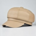 Detailed side view of a beige PU leather newsboy hat featuring a classic stitched crown - Adjustable / Beige