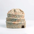 Knitted winter beanie in off-white mixed yarn with colorful speckles and C.C leather patch - Beige