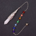 Macro shot of rose quartz hexagonal prism pendant with 7 chakra beads and silver chain - Clear Quartz With 7 Bead Chain