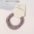 Close-up of high-elastic purple thin hair ties set on a beige display card - Dusty Pink